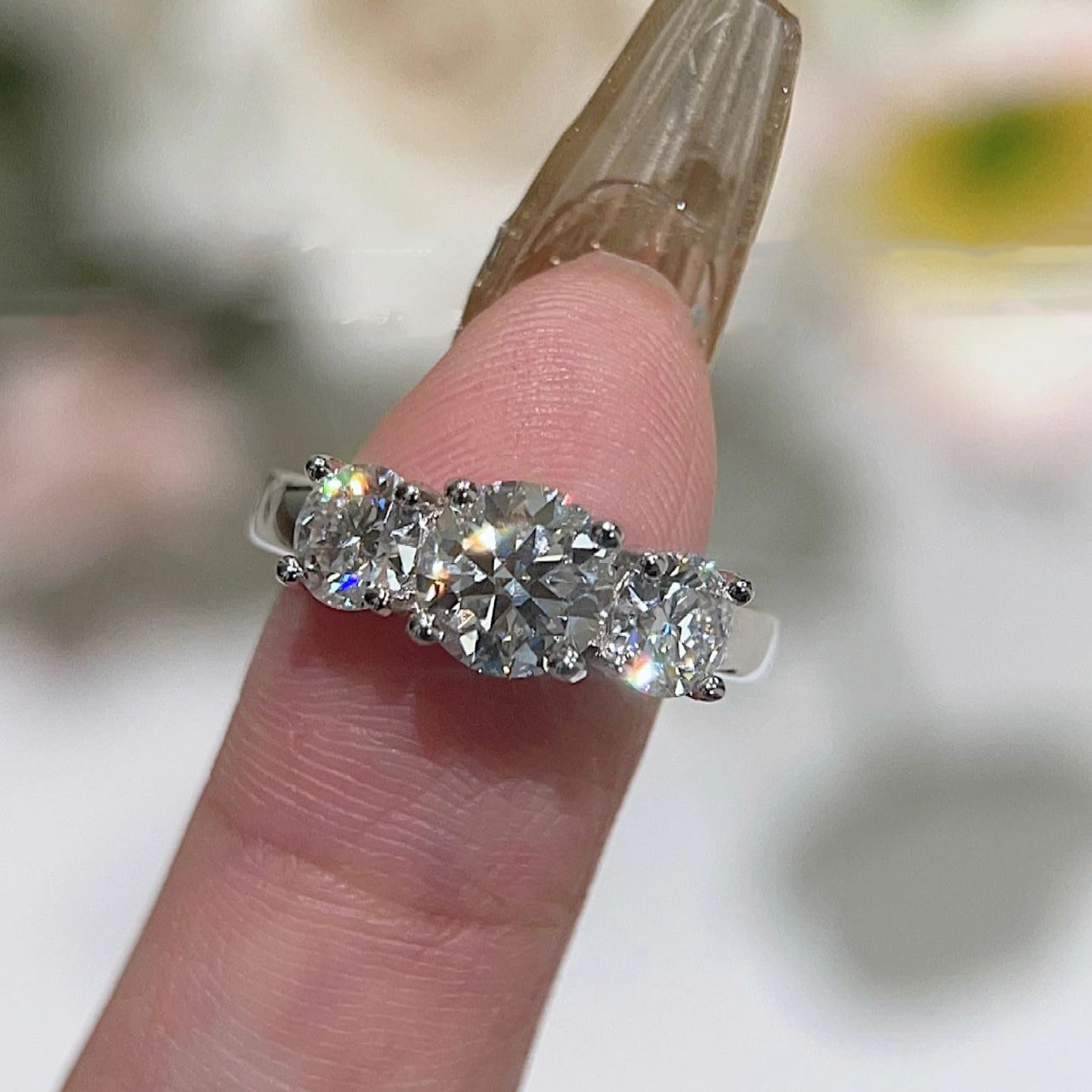 Three stones moissanite ring