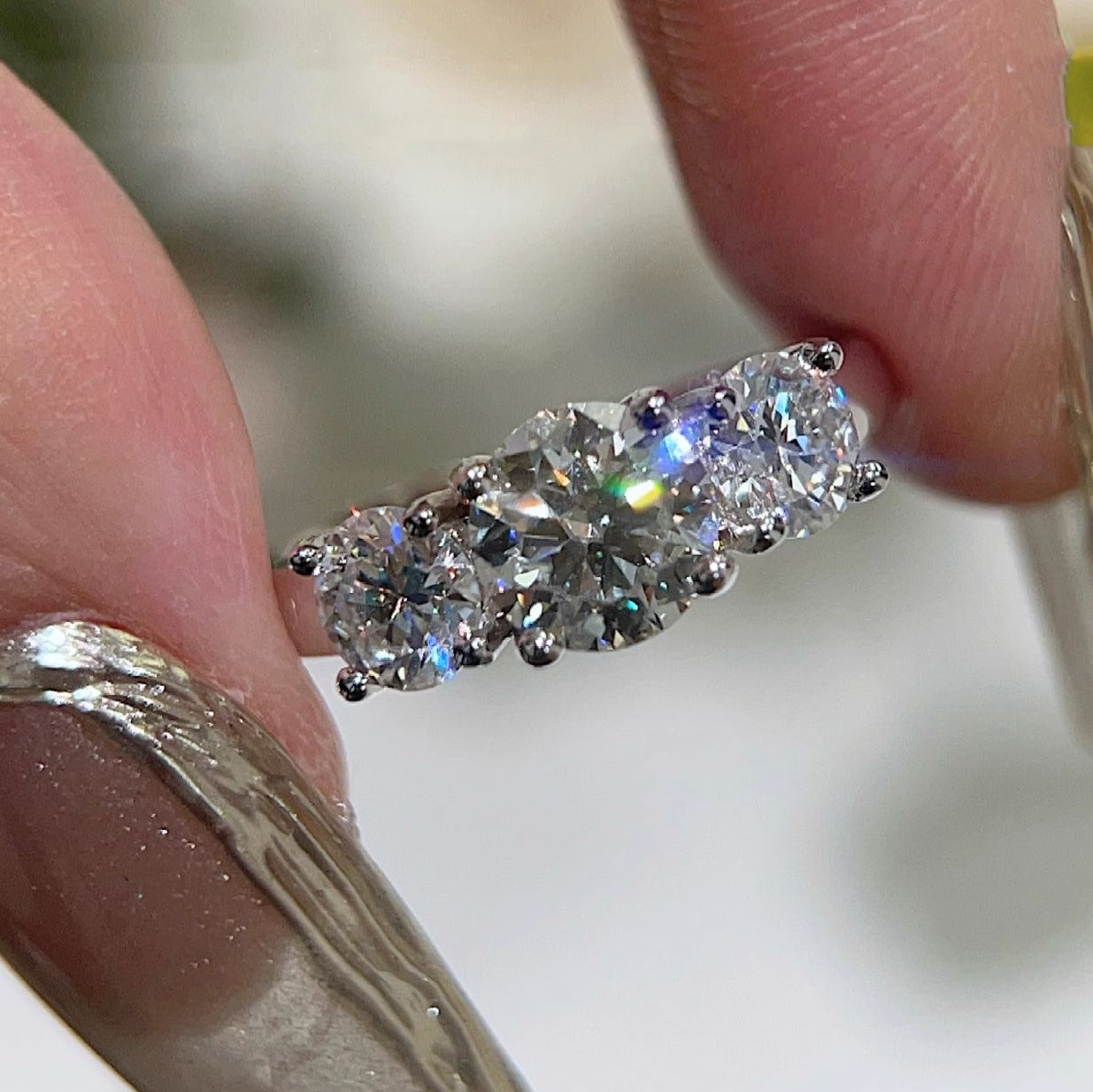 Three stones moissanite ring