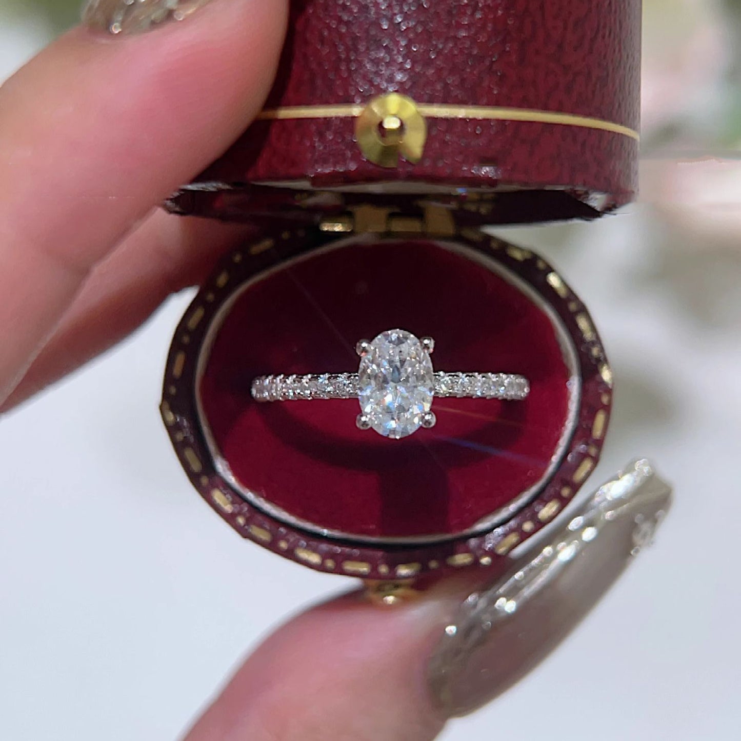 Oval paved moissanite ring