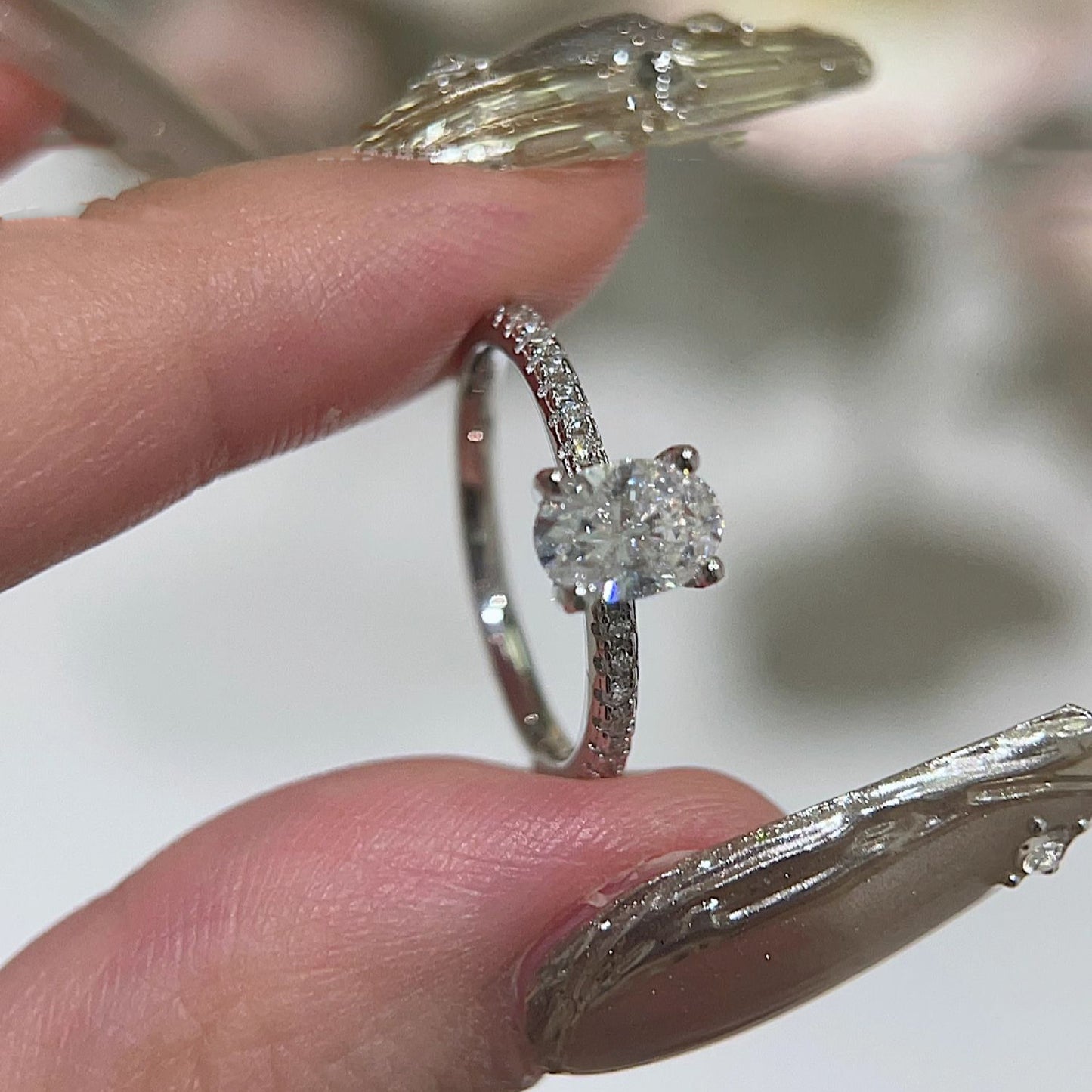 Oval paved moissanite ring
