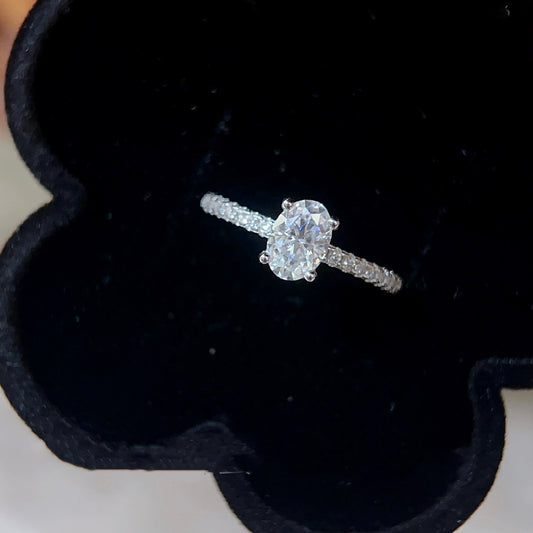Oval paved moissanite ring