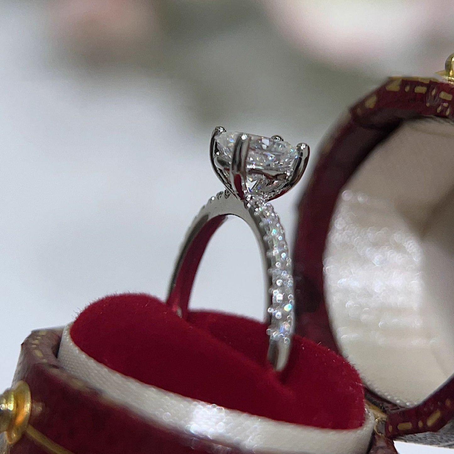Oval paved moissanite ring