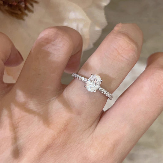 Oval paved moissanite ring