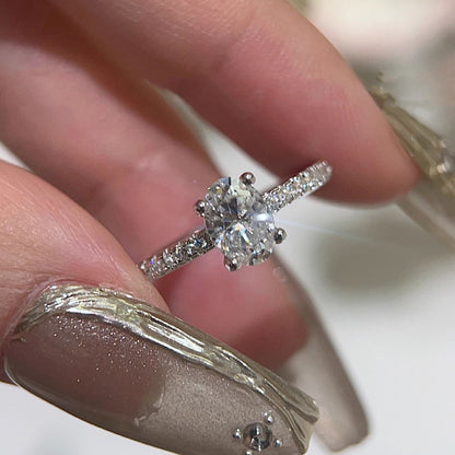Oval paved moissanite ring