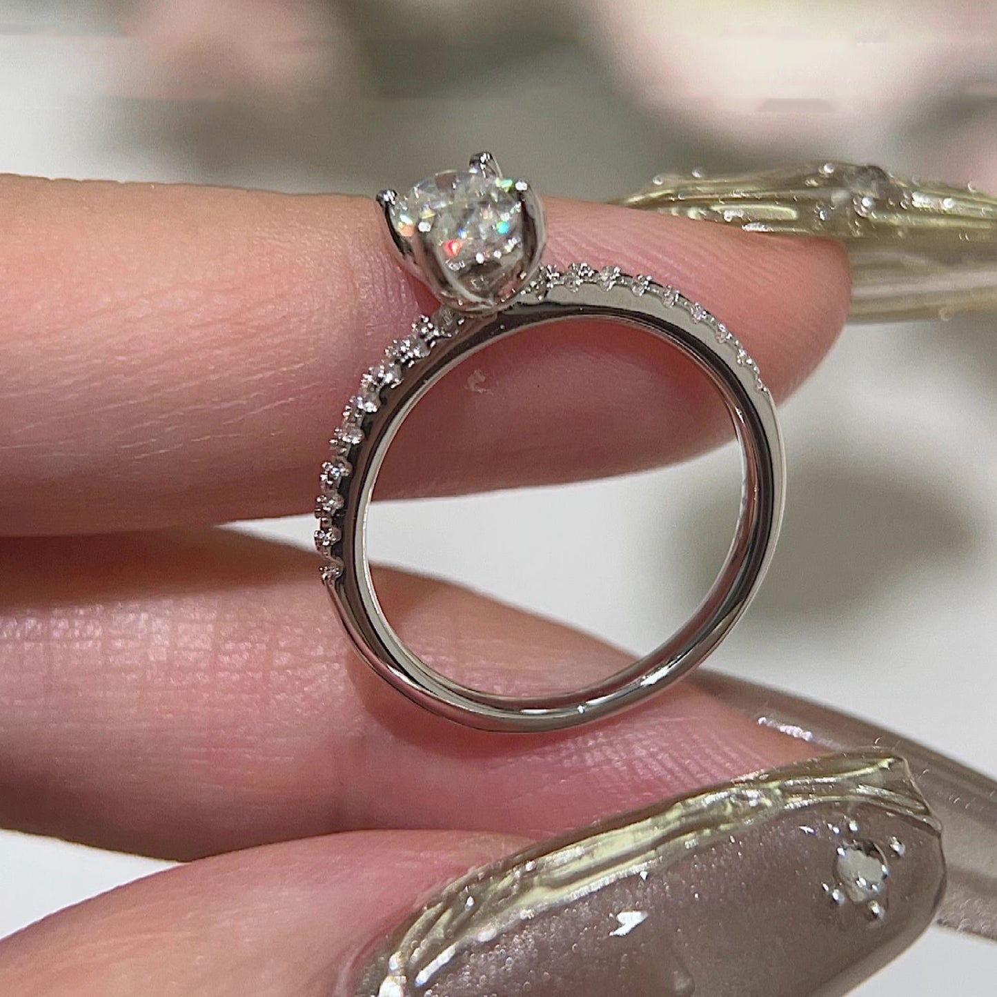 Oval paved moissanite ring