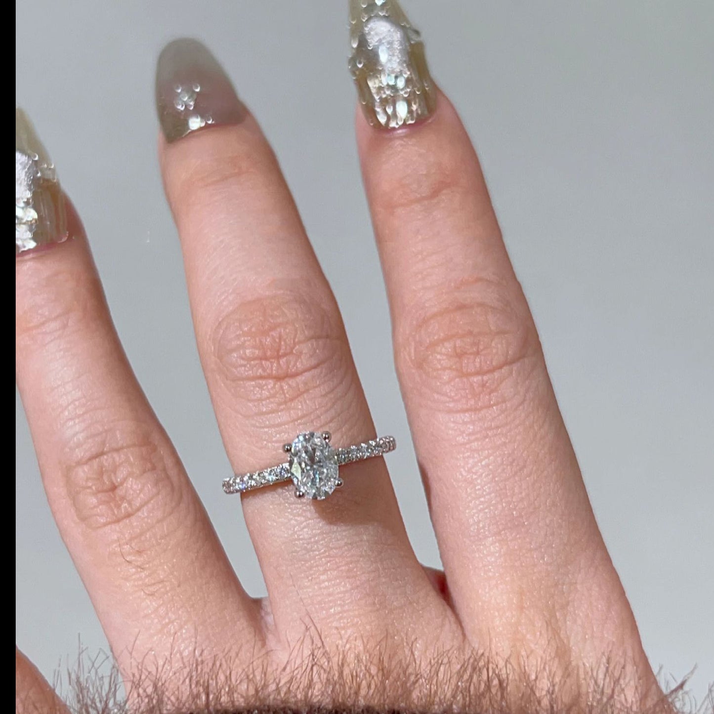 Oval paved moissanite ring